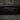 Black Saint Laurent Leather Star Studded Cassandre Clutch - Designer Revival