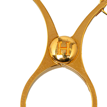 Gold Hermès Filou Glove Holder