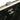 Black Chanel CC Quilted Lambskin Kiss Lock Frame Top Handle Bag - Designer Revival