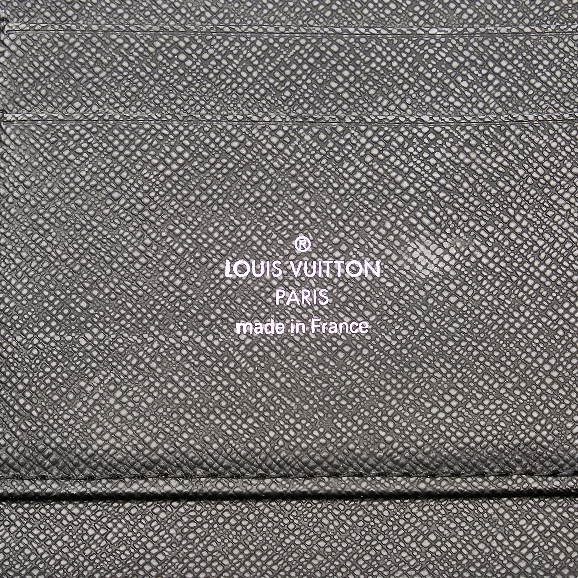 Louis Vuitton Black Taiga Atoll Travel Organizer Leather Pony-style  calfskin ref.182350 - Joli Closet